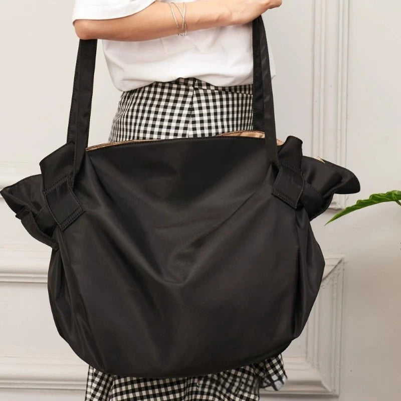 CONVERTIBLE TOTE-TO-MAT BAG.